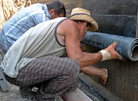 Nous faisons l'imperméabilisation