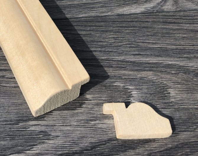 Perle de vitrage en bois