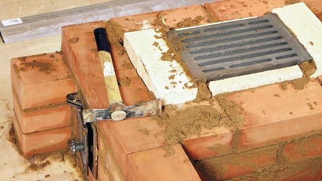 comment installer des grilles dans le poêle