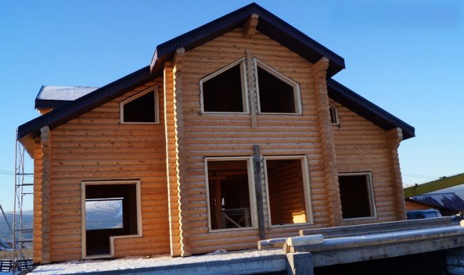 Comment couper une porte dans une maison en rondins