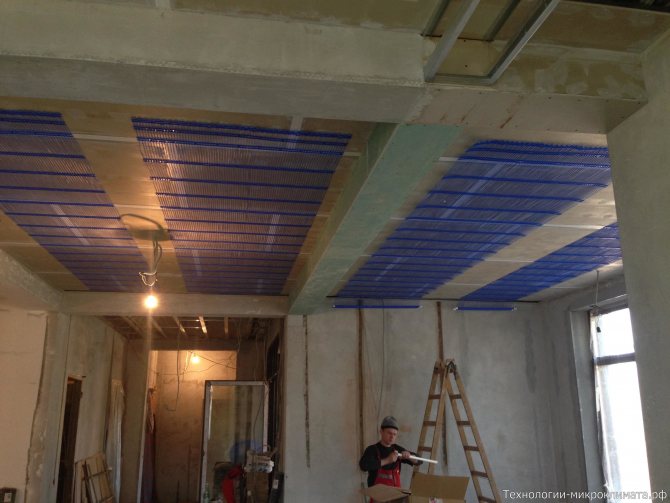 Installation de tapis capillaires sur cloison sèche