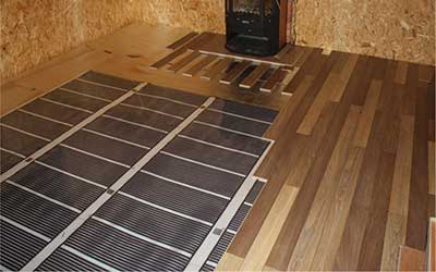 installation de stratifié sur un plancher chauffant électrique