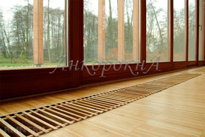 onvecteurs dans le sol près de la fenêtre panoramique photo