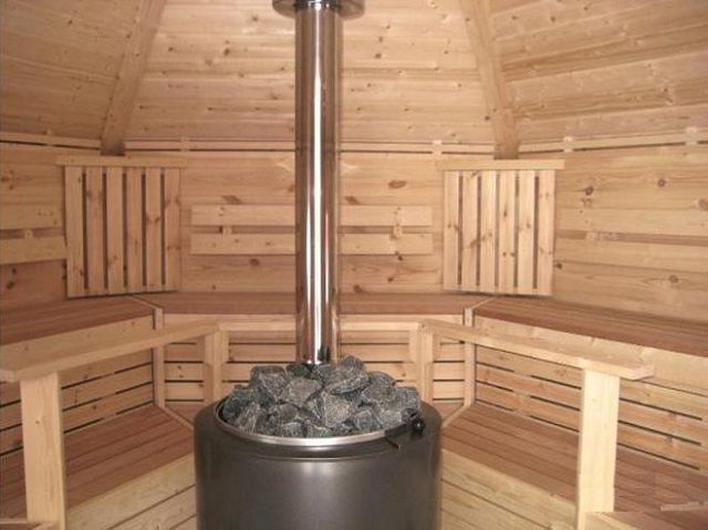 Poêle chauffant avec cheminée interne