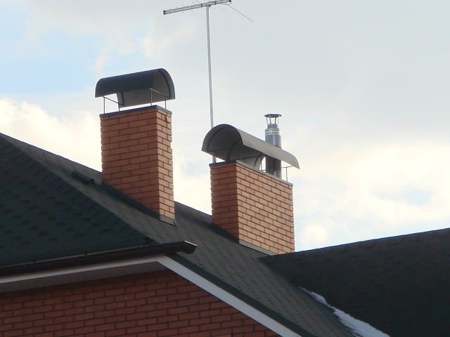 Visière hémisphérique pour le tuyau de cheminée