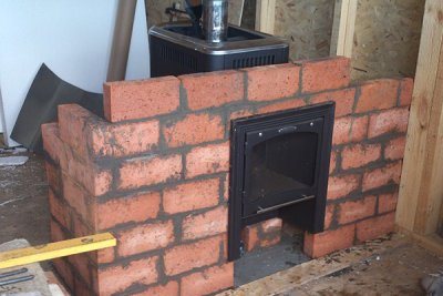 Portail pour un poêle de sauna en brique