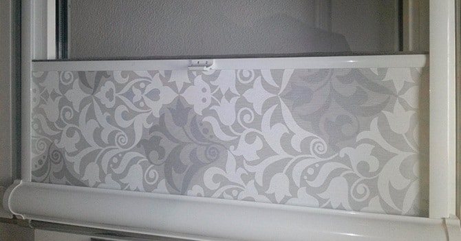 Mécanisme de ressort de store à rouleau