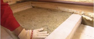 Pose de laine minérale sur le sol