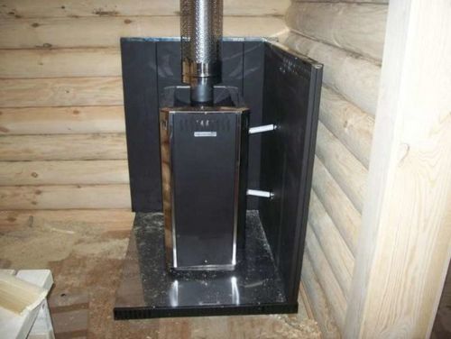 Installation d'un poêle dans un bain public sur un plancher en bois: instructions étape par étape