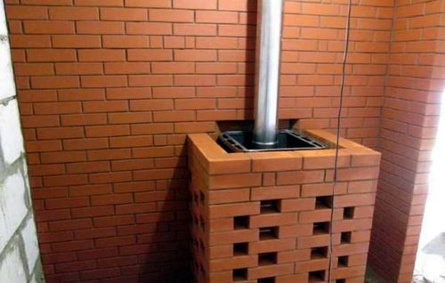 Installation d'un poêle dans un bain public sur un plancher en bois: instructions étape par étape