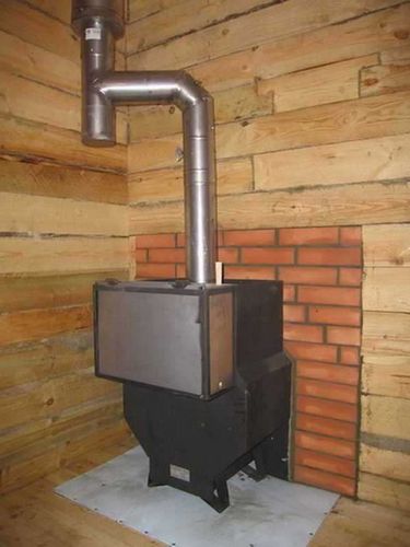 Installation d'un poêle dans un bain public sur un plancher en bois: instructions étape par étape