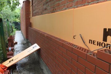 Isolation thermique par EPS d'une maison en brique