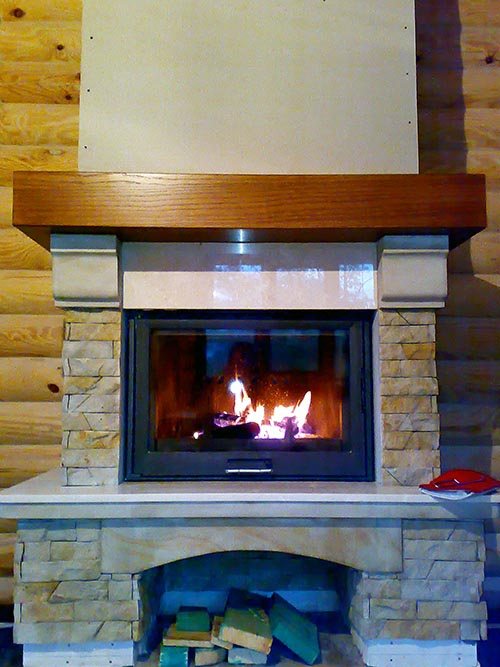 Une cheminée à foyer fermé est la solution la plus sûre pour une résidence d'été