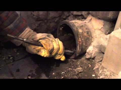 Remplacement d'un té dans une colonne montante d'égout